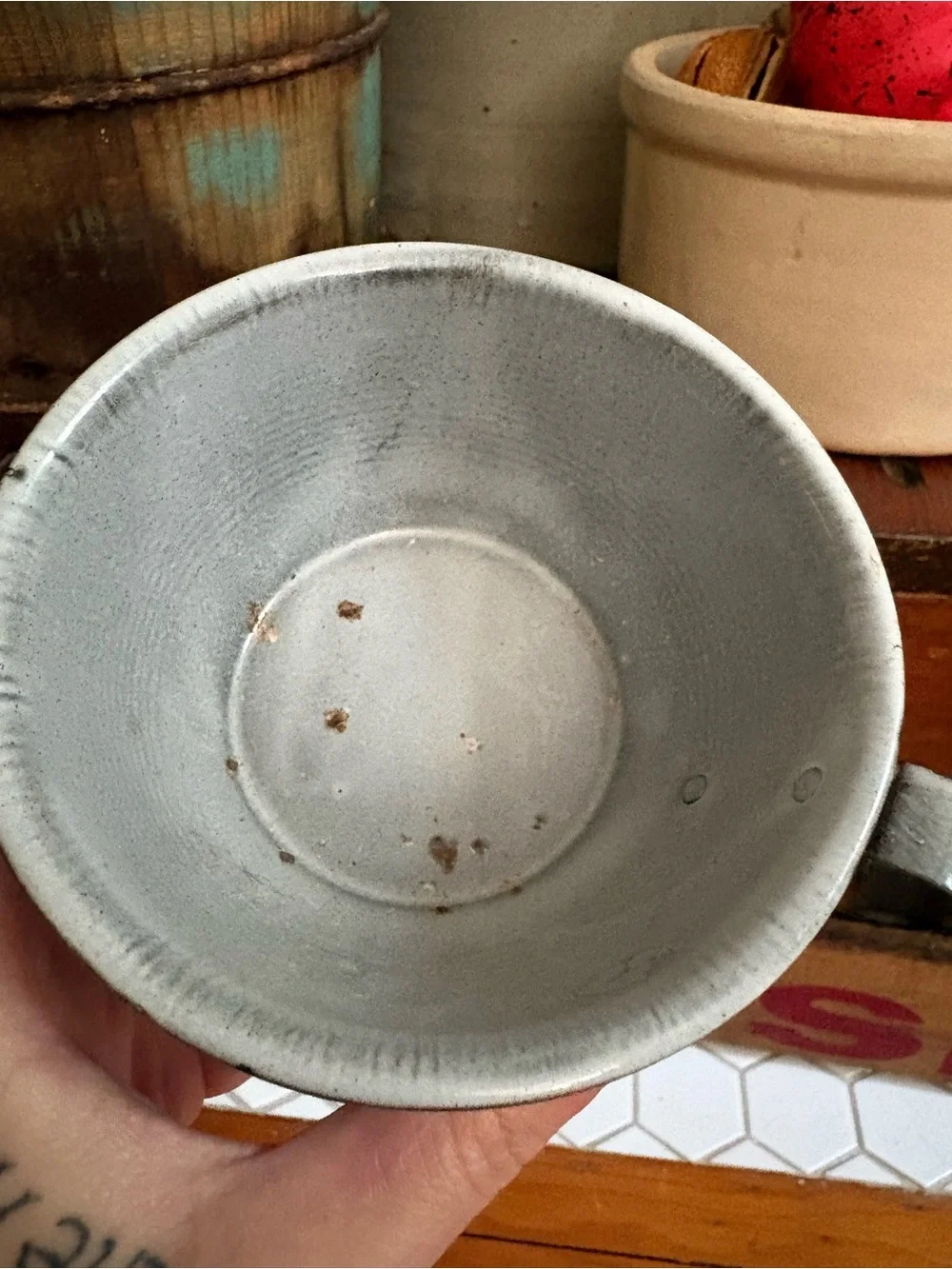 Grey enamelware mug